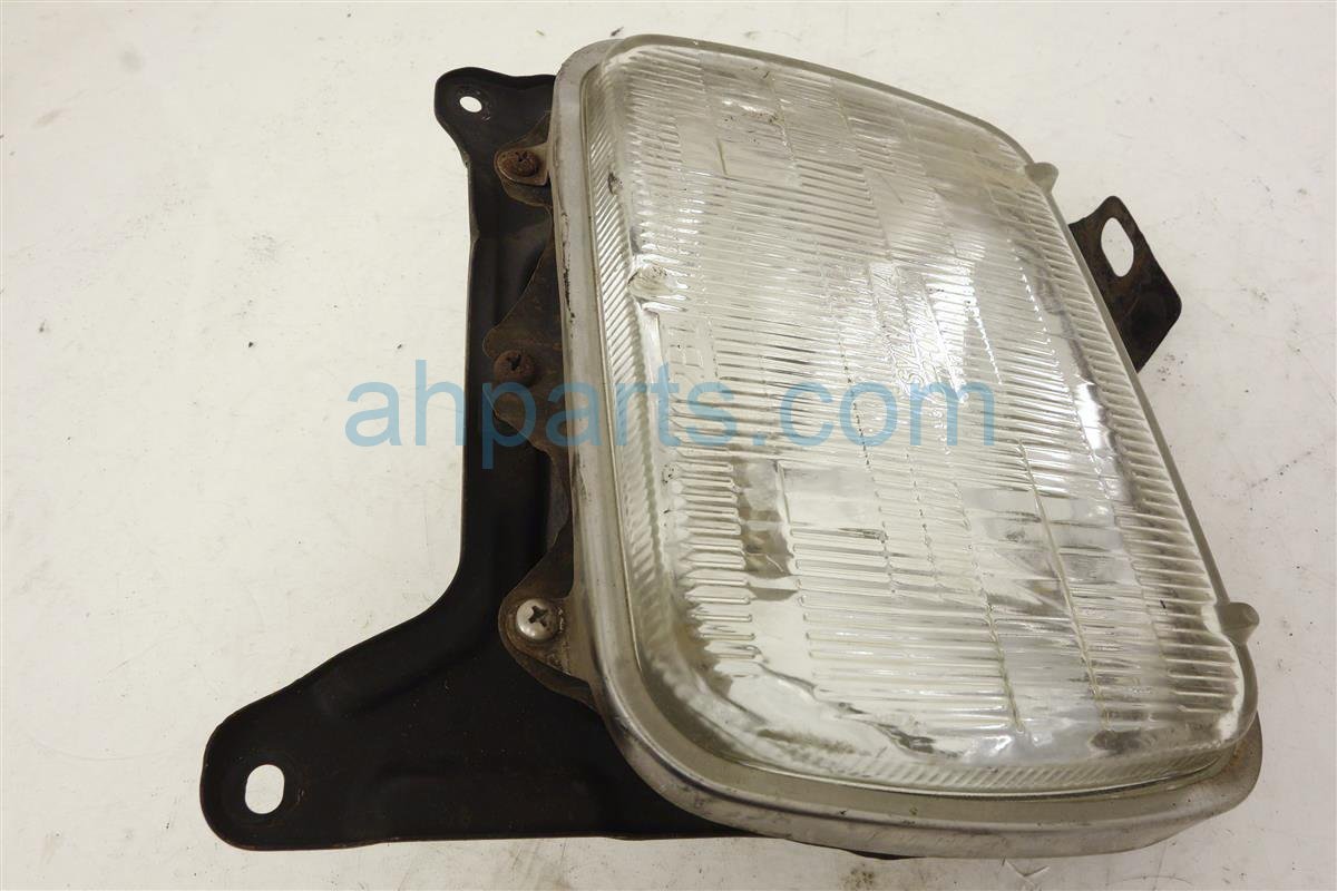 thumbnail image 2 of Left Tail Light With Chrome Trim For 85-86 Nissan 720 Pickup Driver Side 2 of 5
