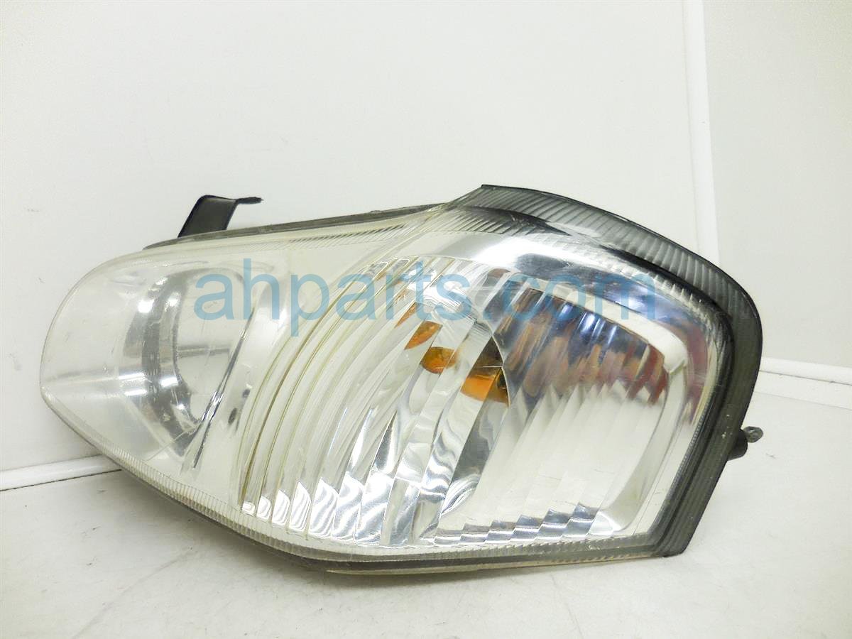 $30 Nissan LH Headlamp Assembly