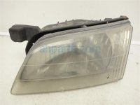 $35 Nissan LH Headlamp - 4DR - 2.4L - GXE