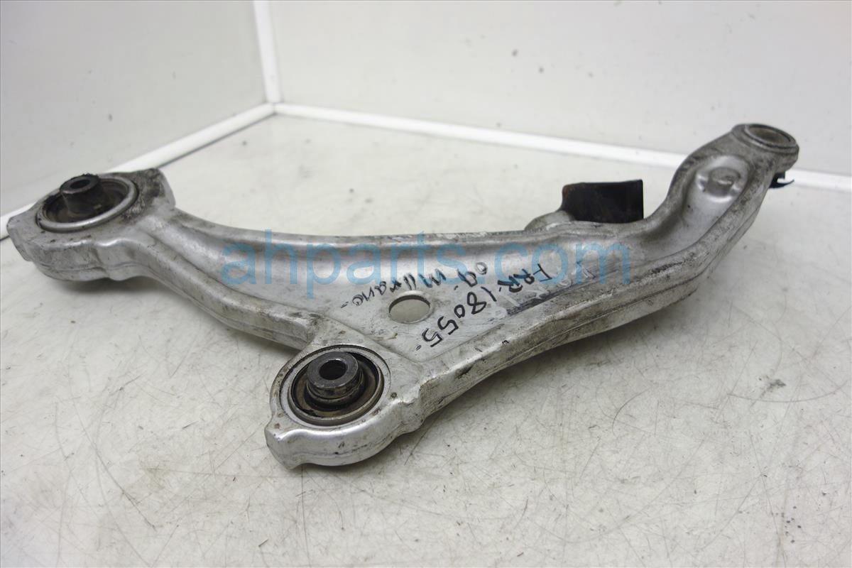 This front passenger lower control arm is genuine and has part numbers 5450...