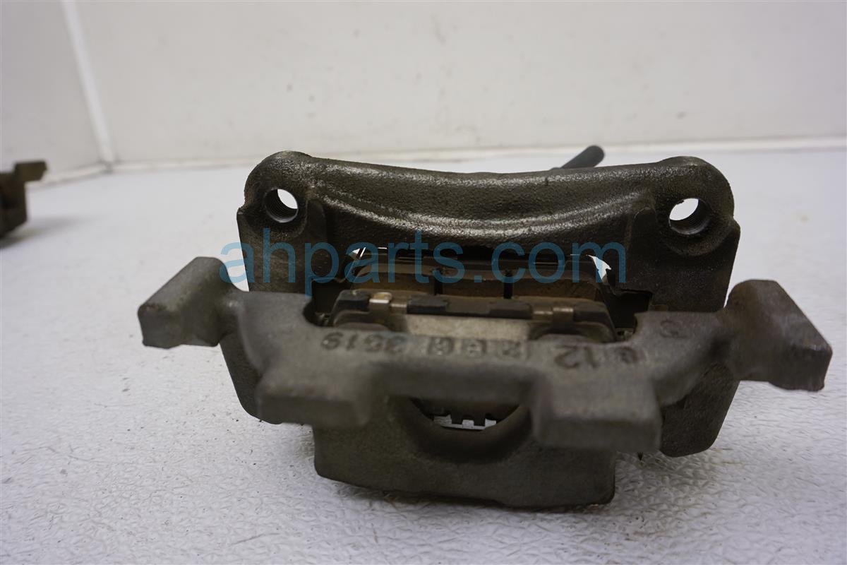 $29 Nissan RR/LH BRAKE CALIPER