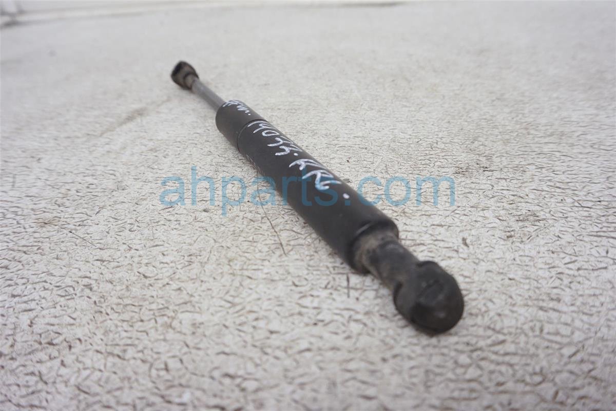 $10 Nissan LH TRUNK STRUT / STAY OPENER