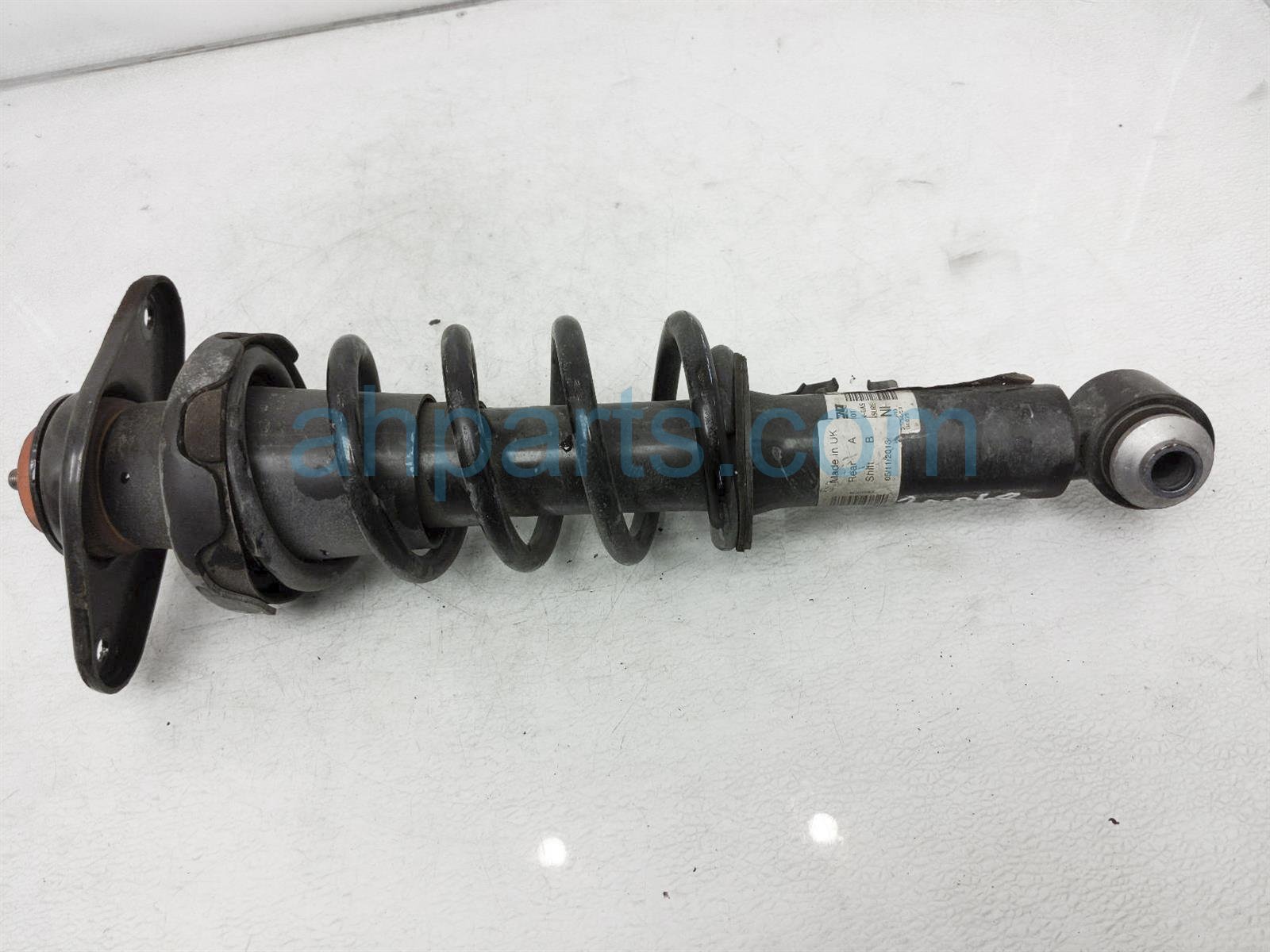 $60 BMW RR/LH STRUT + SPRING $60 BMW RR/LH STRUT + SPRING