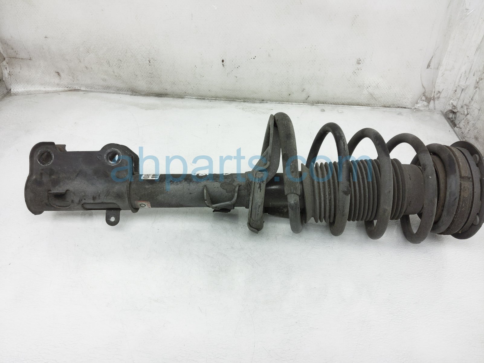 $49 Ford FR/LH STRUT + SPRING $49 Ford FR/LH STRUT + SPRING