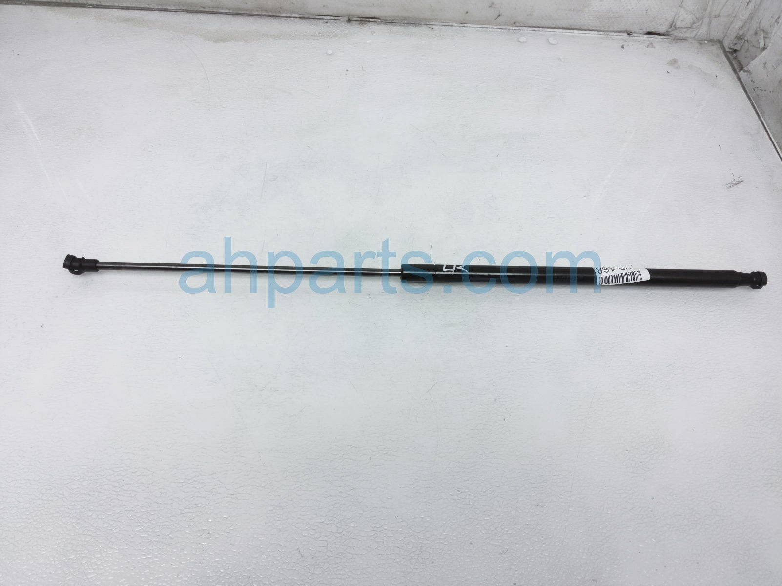 $13 Nissan LH TRUNK SHOCK