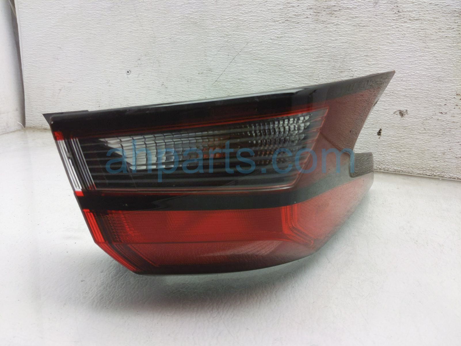 $75 Nissan LH TAIL LIGHT - On Body $75 Nissan LH TAIL LIGHT - On Body