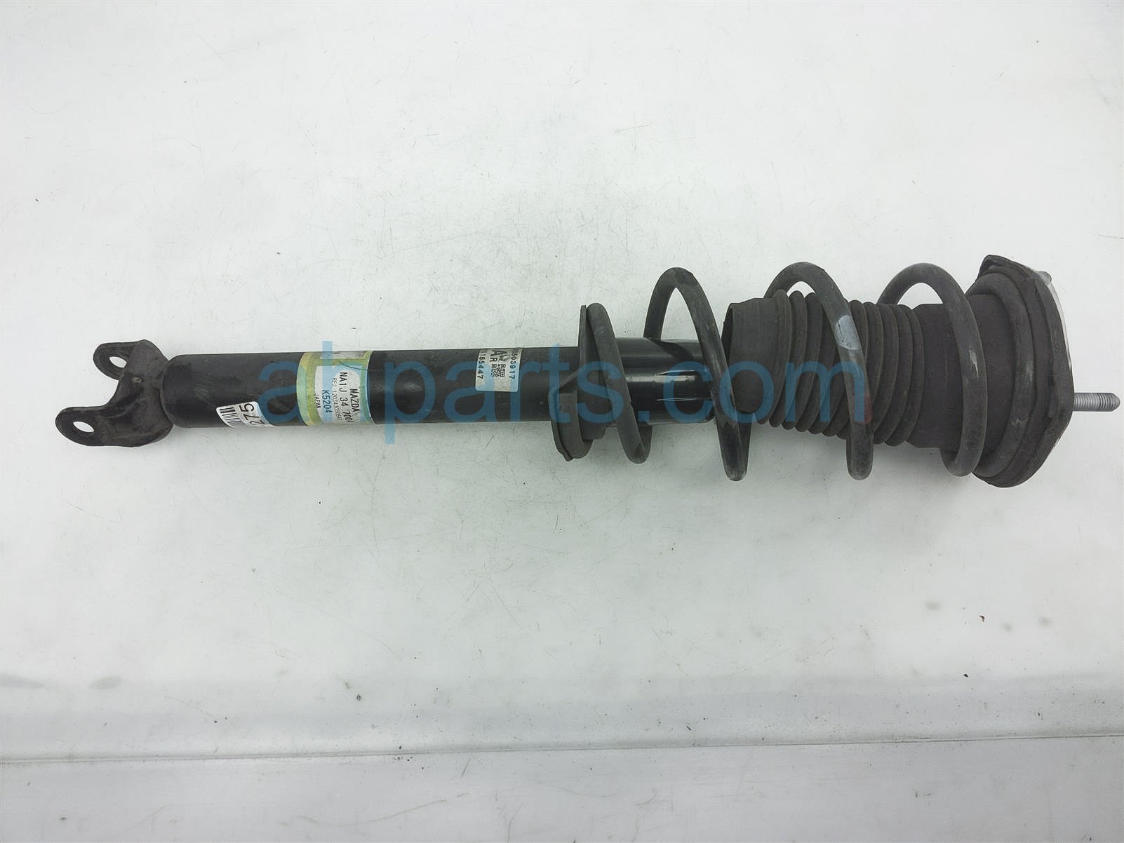 $95 Mazda FR/RH STRUT + SPRING $95 Mazda FR/RH STRUT + SPRING