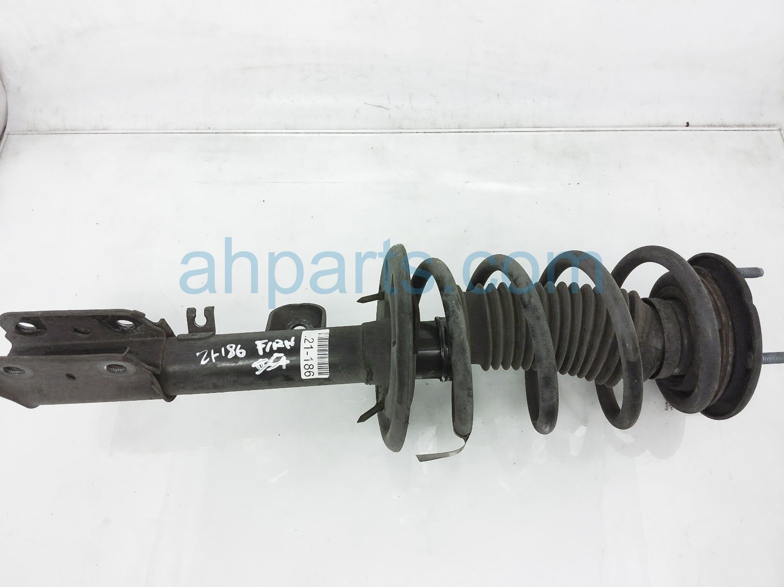 $99 Ford FR/RH STRUT + SPRING $99 Ford FR/RH STRUT + SPRING