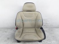 $125 Volvo FR/LH SEAT ASSY (BIEGE LEATHER)