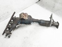 $599 Ford EXHAUST MANIFOLD W/ CONVERTER