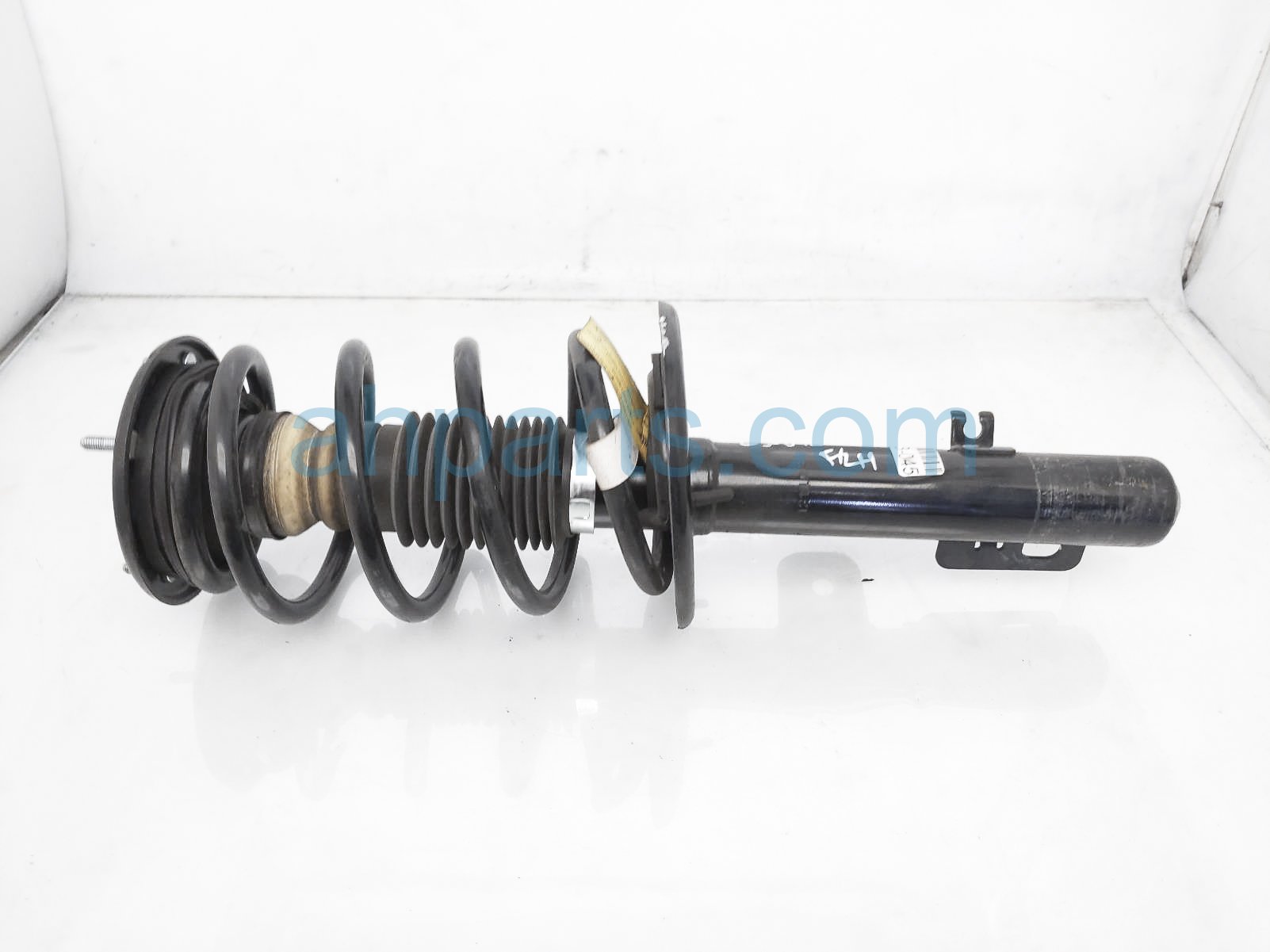 $100 Ford FR/LH STRUT + SPRING $100 Ford FR/LH STRUT + SPRING