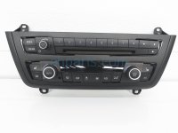 $100 BMW RADIO & CLIMATE CONTROLS (ON DASH)