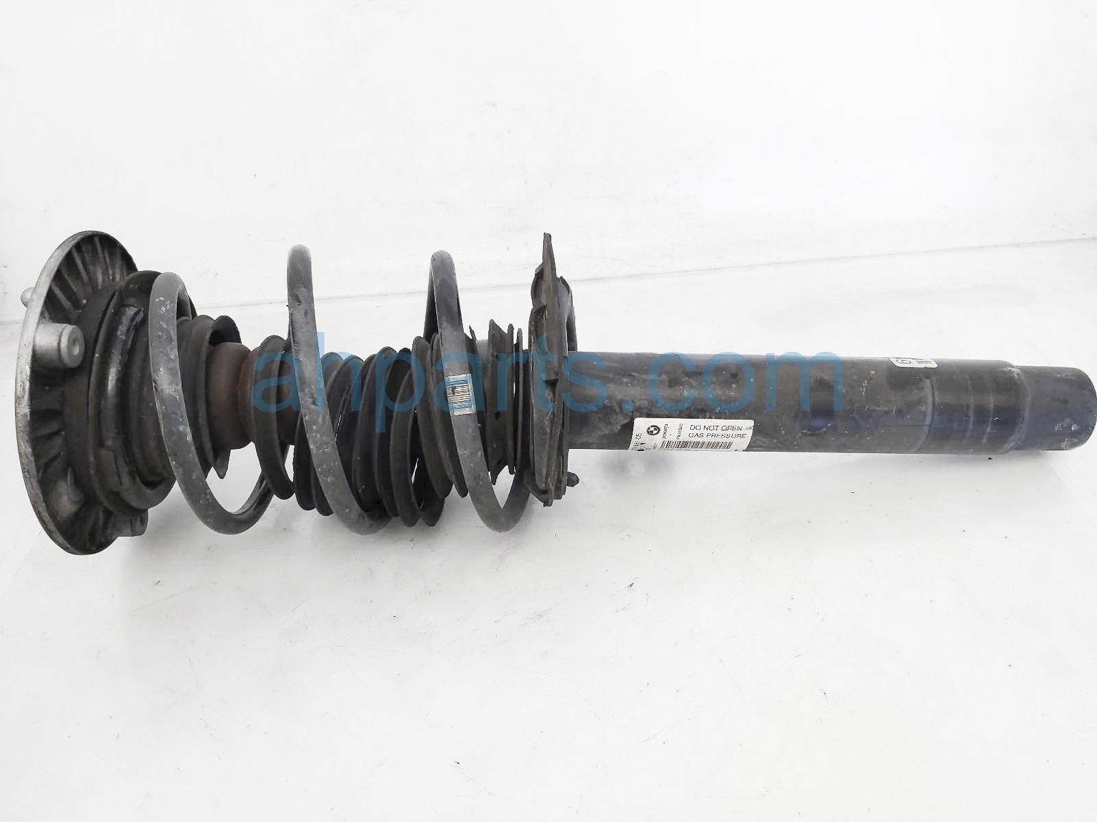 $125 BMW FR/RH STRUT + SPRING $125 BMW FR/RH STRUT + SPRING