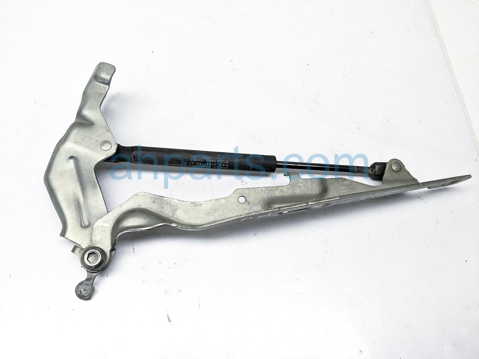 $30 Volvo RH HOOD HINGE W/ LIFT CYLINDER $30 Volvo RH HOOD HINGE W/ LIFT CYLINDER