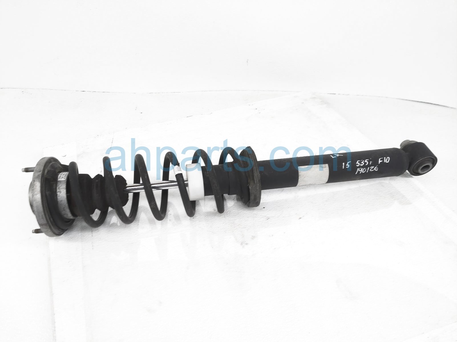 $69 BMW RR/LH STRUT + SPRING $69 BMW RR/LH STRUT + SPRING
