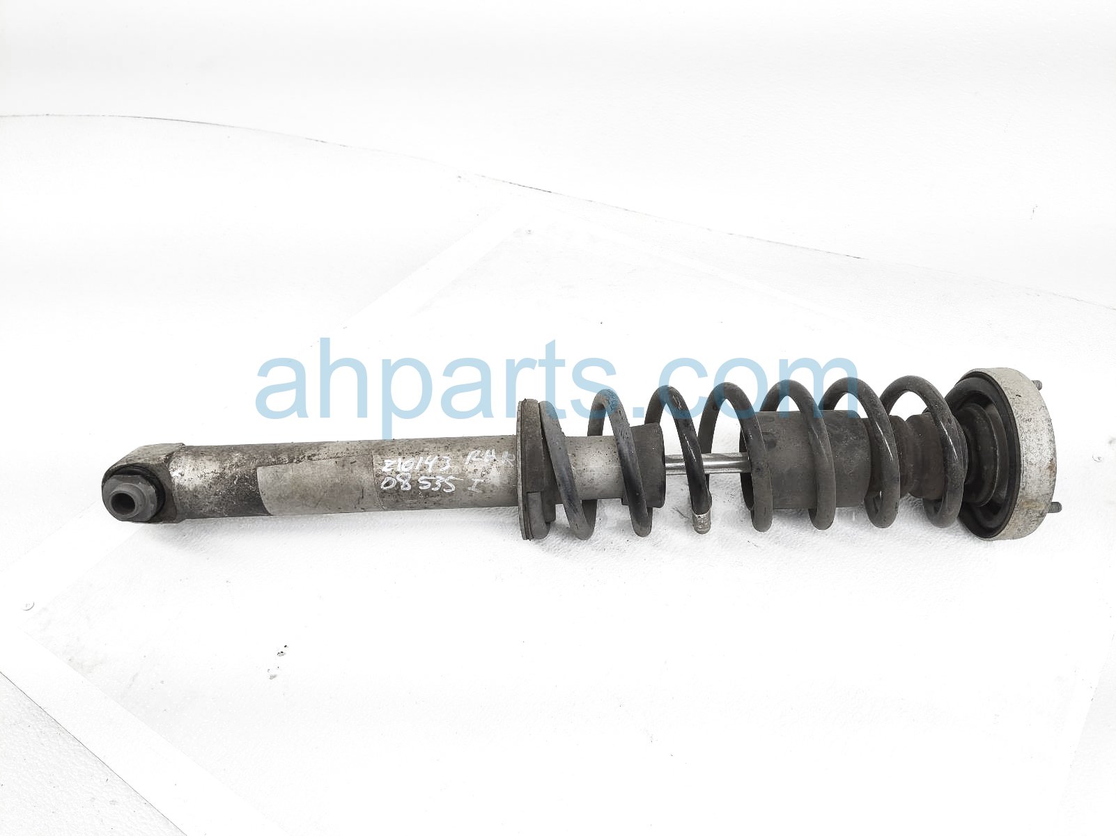 $65 BMW RR/RH STRUT + SPRING $65 BMW RR/RH STRUT + SPRING