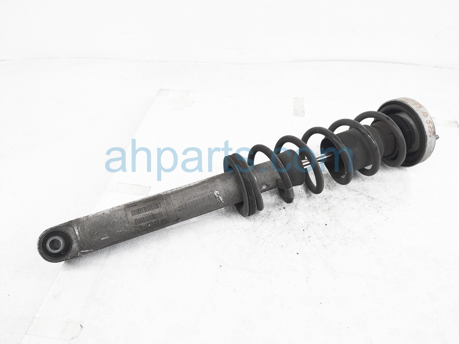 $65 BMW RR/LH STRUT + SPRING $65 BMW RR/LH STRUT + SPRING