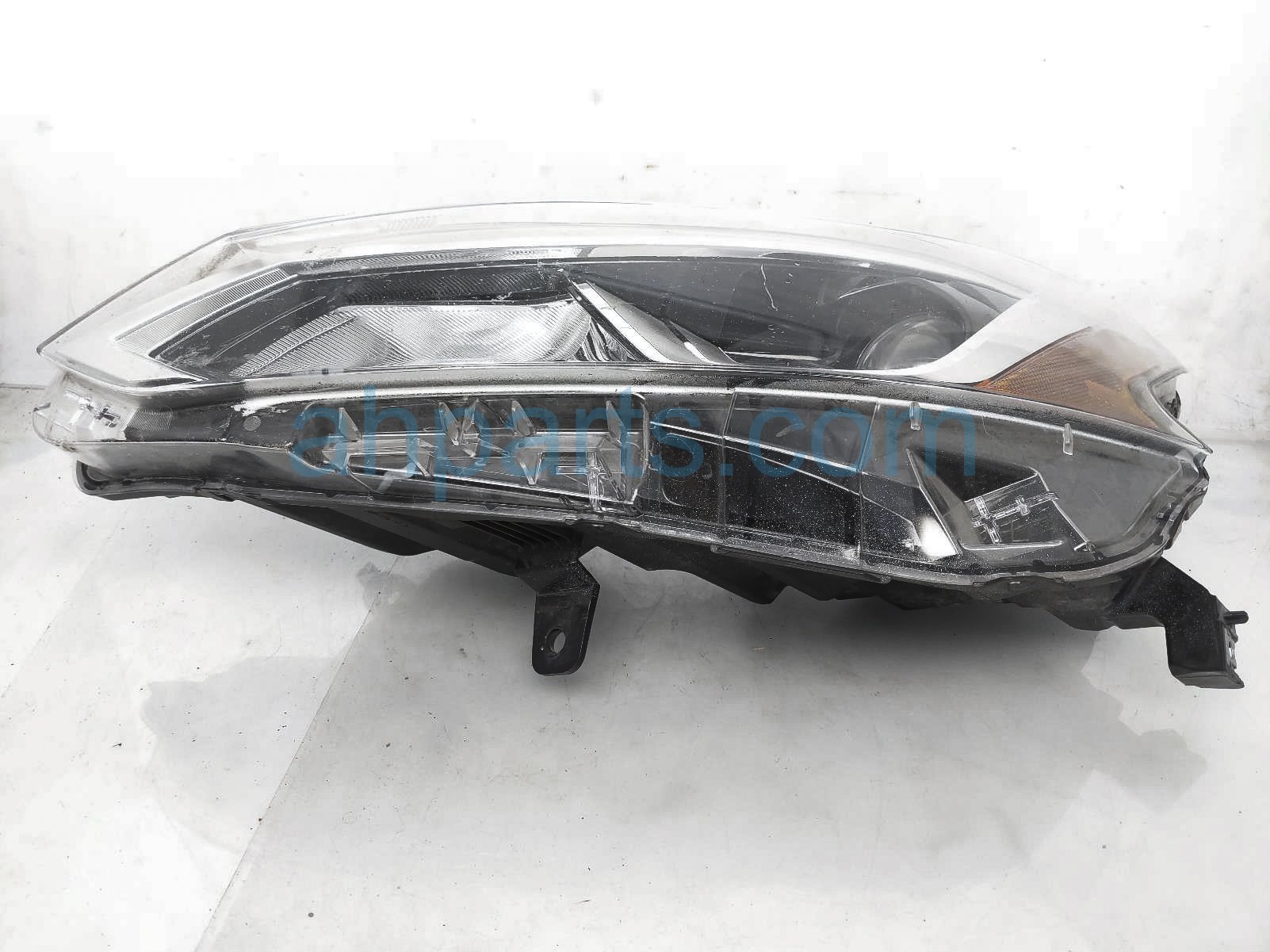 $165 Nissan LH HEADLAMP / LIGHT