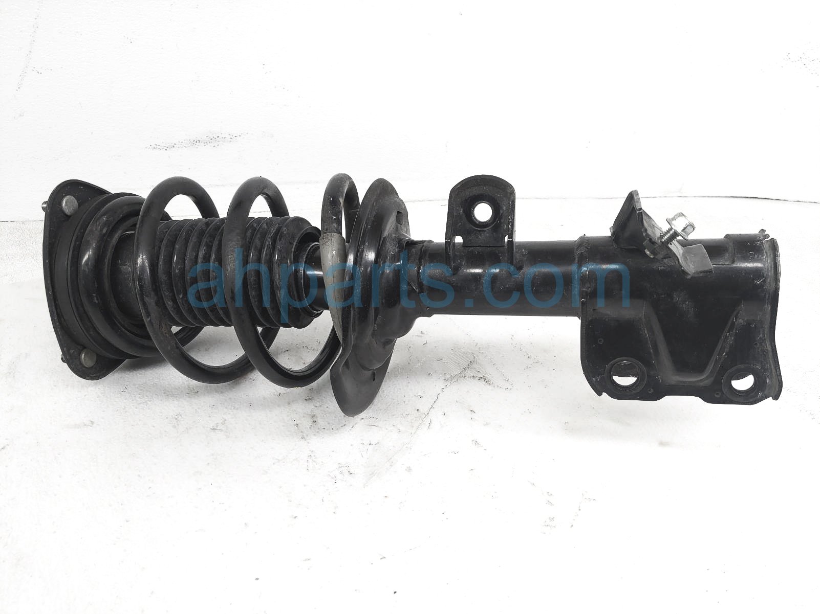 $125 Subaru FR/LH STRUT + SPRING