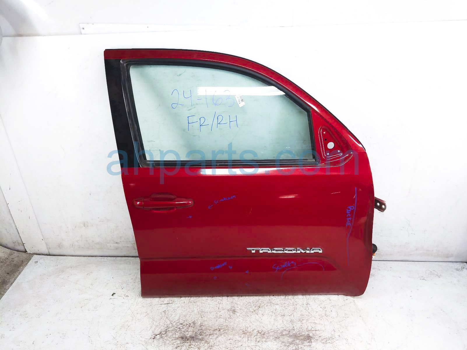 $950 Toyota FR/RH DOOR - RED - NO MIRROR/TRIM*