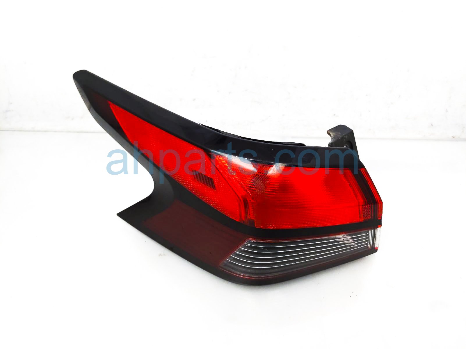 $149 Nissan LH TAIL LAMP (ON BODY)