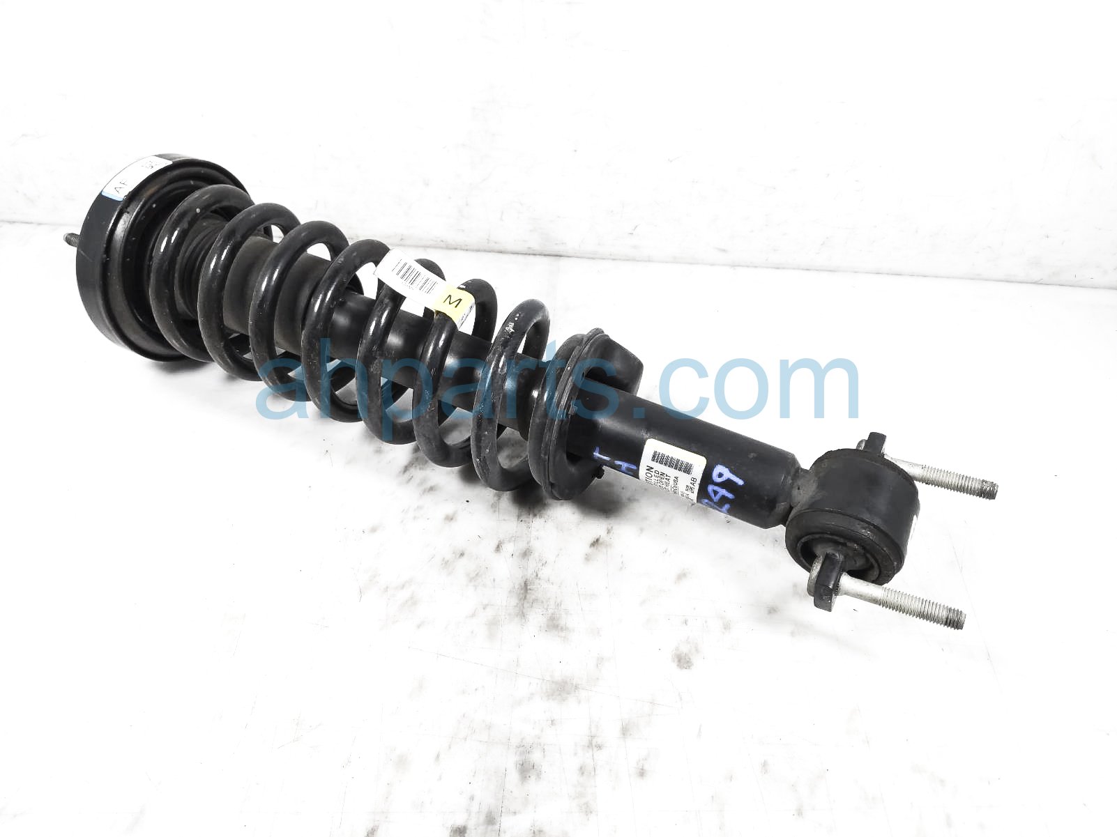 $99 Ford FR/RH STRUT + SPRING $99 Ford FR/RH STRUT + SPRING