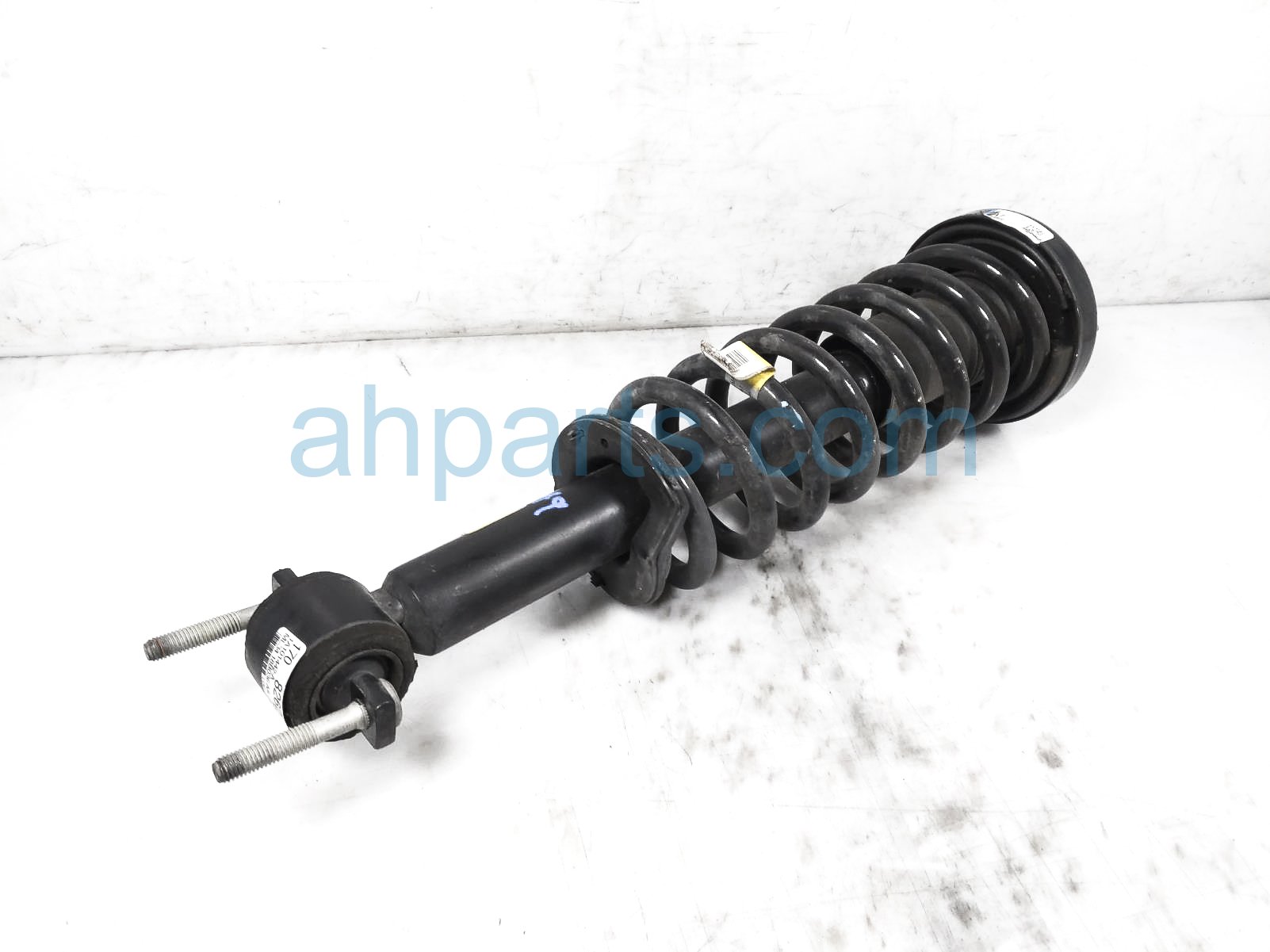 $99 Ford FR/LH STRUT + SPRING $99 Ford FR/LH STRUT + SPRING