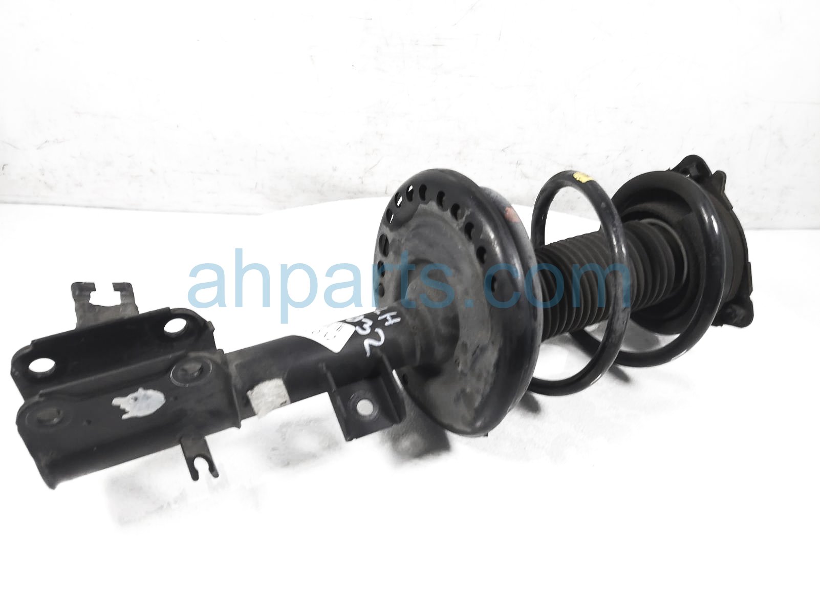 $75 Nissan FR/LH STRUT + SPRING - 2.5L
