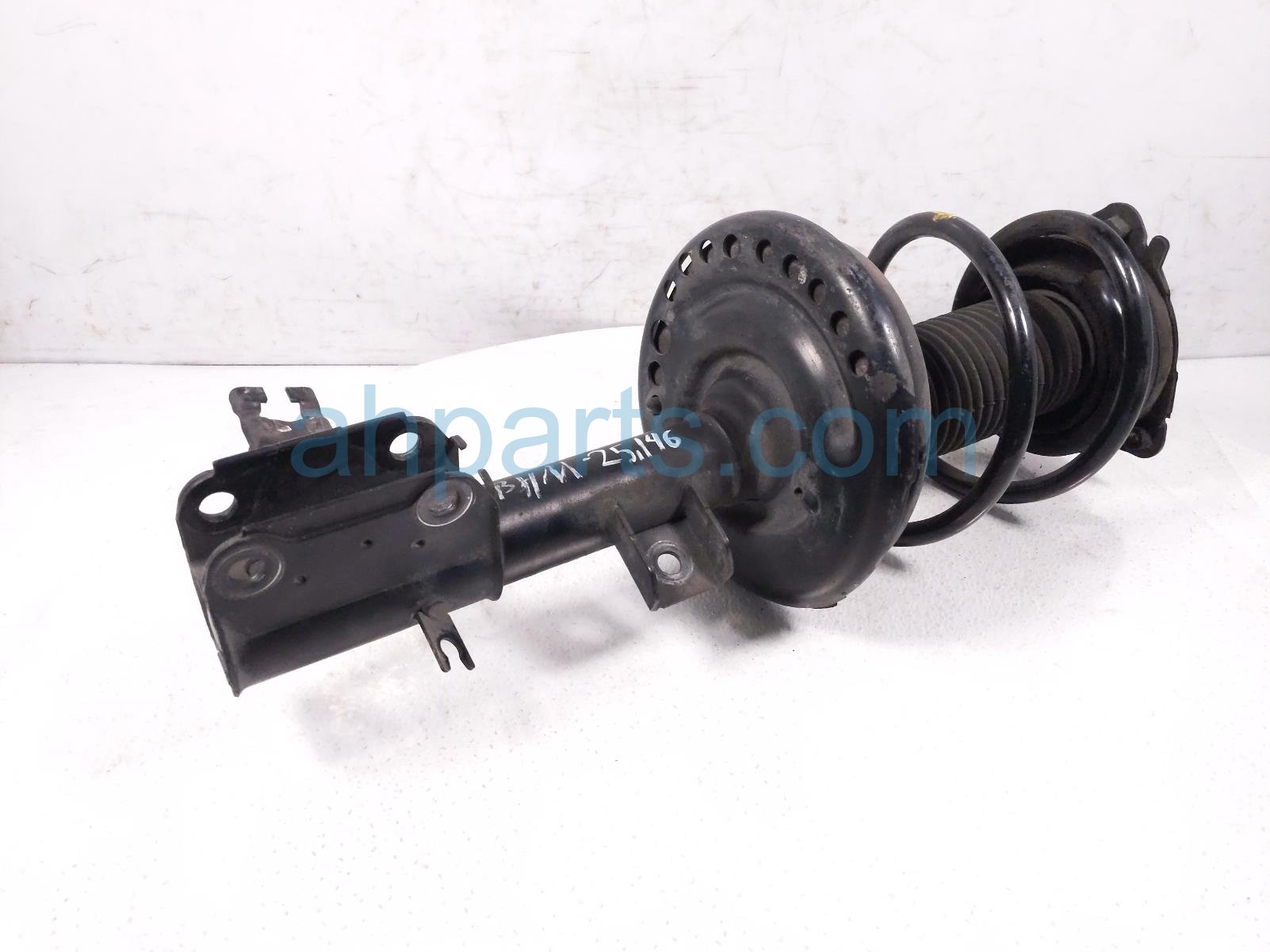 $75 Nissan FR/LH STRUT + SPRING