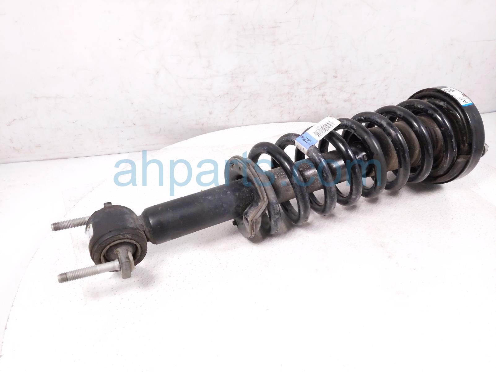 $99 Ford FR/RH STRUT + SPRING $99 Ford FR/RH STRUT + SPRING