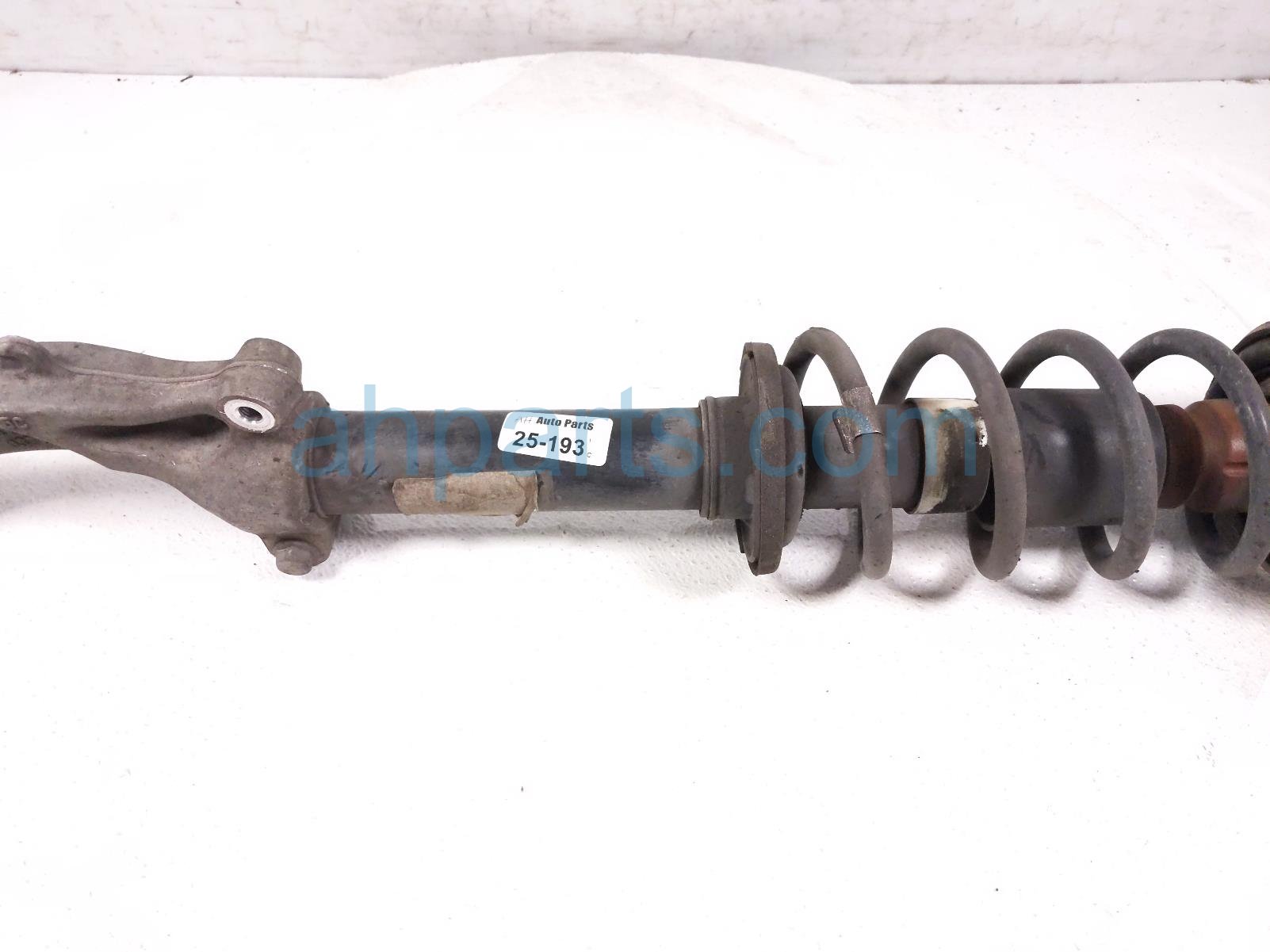 $125 Audi FR/LH STRUT ABSORBER + SPRING