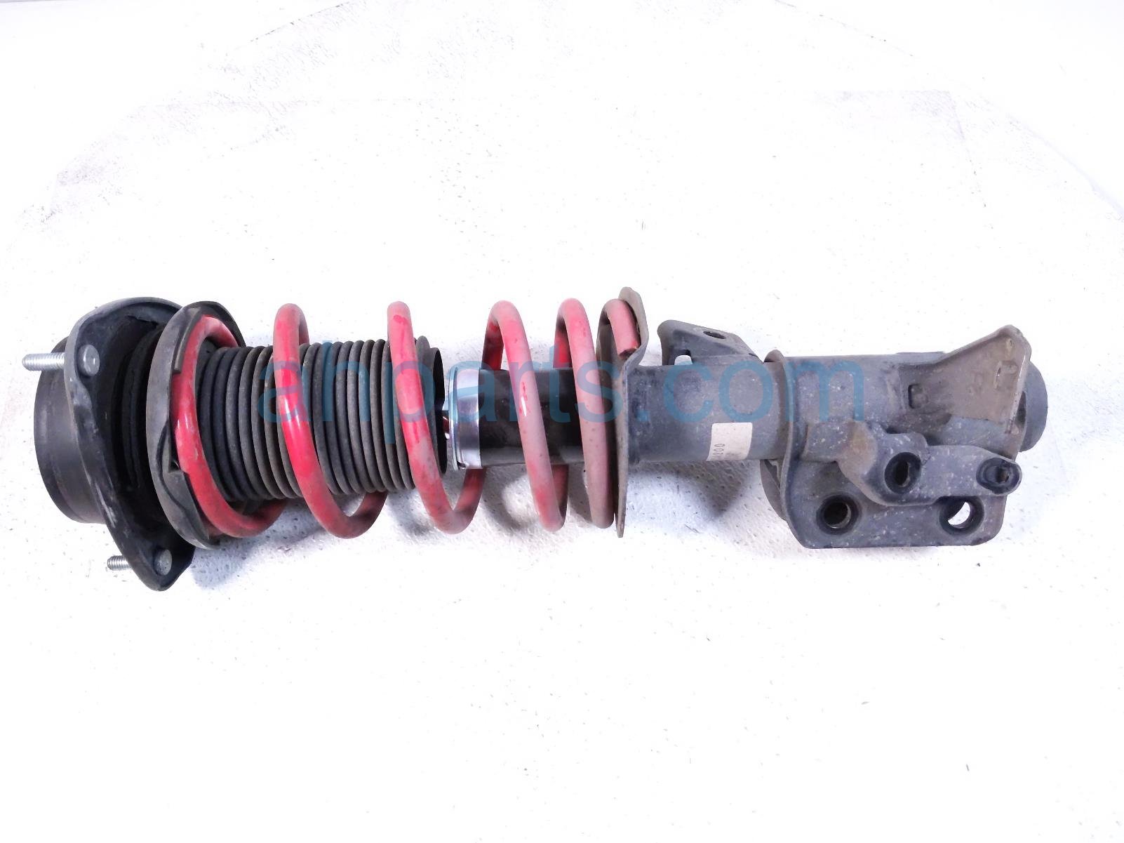 $99 Toyota FR/RH STRUT WITH TRD SPRING $99 Toyota FR/RH STRUT WITH TRD SPRING