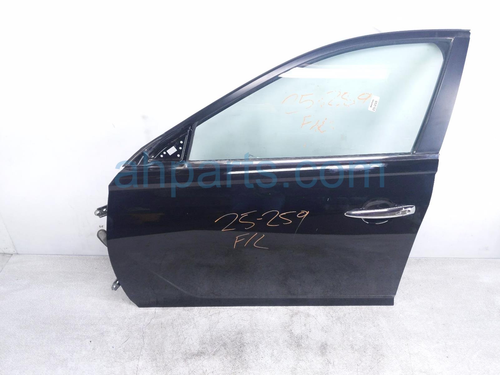 $895 Nissan FR/LH DOOR - BLACK - NO MIRROR/TRIM