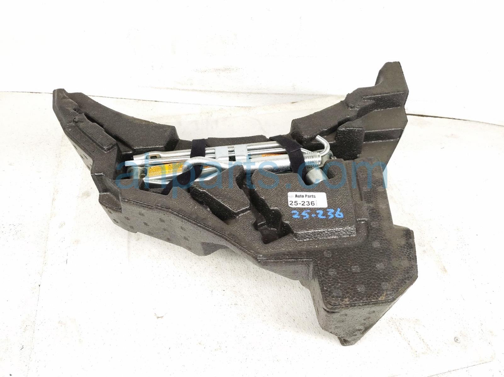 $145 Nissan SPARE TIRE TOOL KIT W/ FOAM HOLDER $145 Nissan SPARE TIRE TOOL KIT W/ FOAM HOLDER