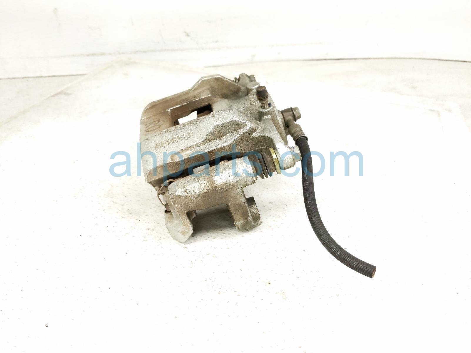 $95 Nissan FR/LH BRAKE CALIPER