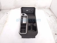 $125 Nissan CENTER CONSOLE TRIM W/CUP HLD -BLK $125 Nissan CENTER CONSOLE TRIM W/CUP HLD -BLK
