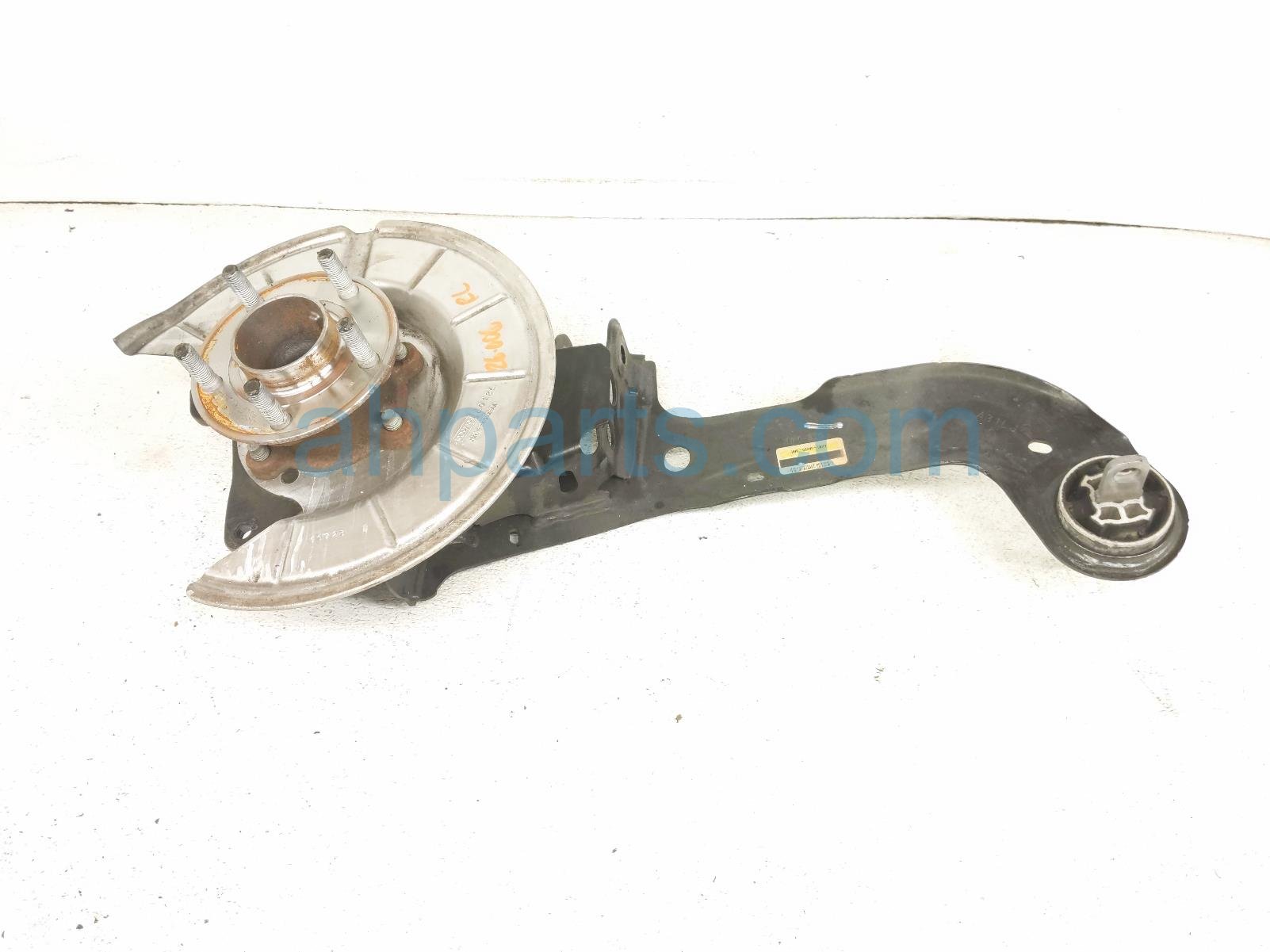 Ford RR/LH LOWER ARM + SPINDLE KNUCKLE