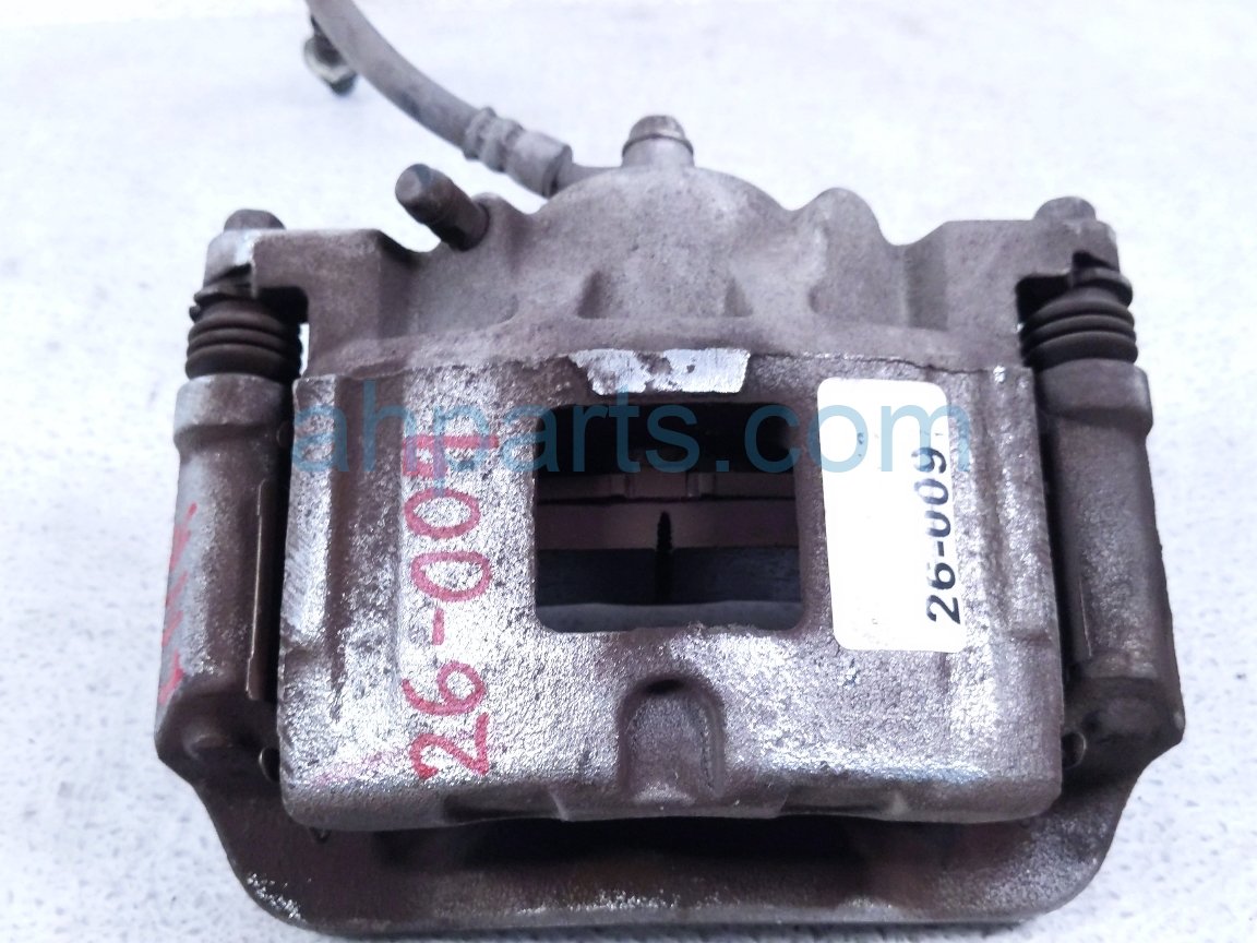 $75 Nissan RR/LH BRAKE CALIPER
