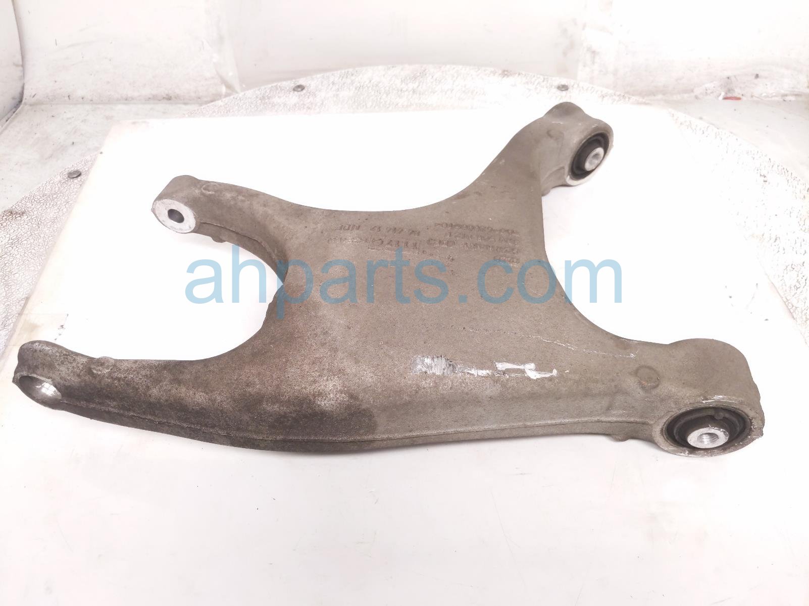 Rear passenger LOWER SPRING SEAT ARM