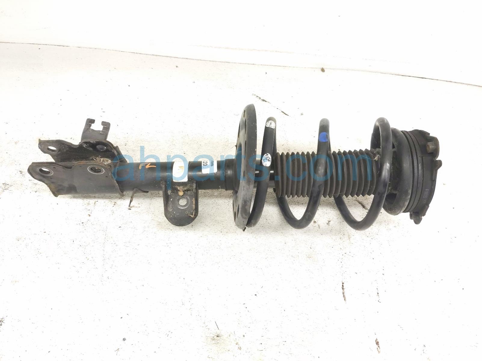 Nissan FR/LH STRUT ABSORBER + SPRING