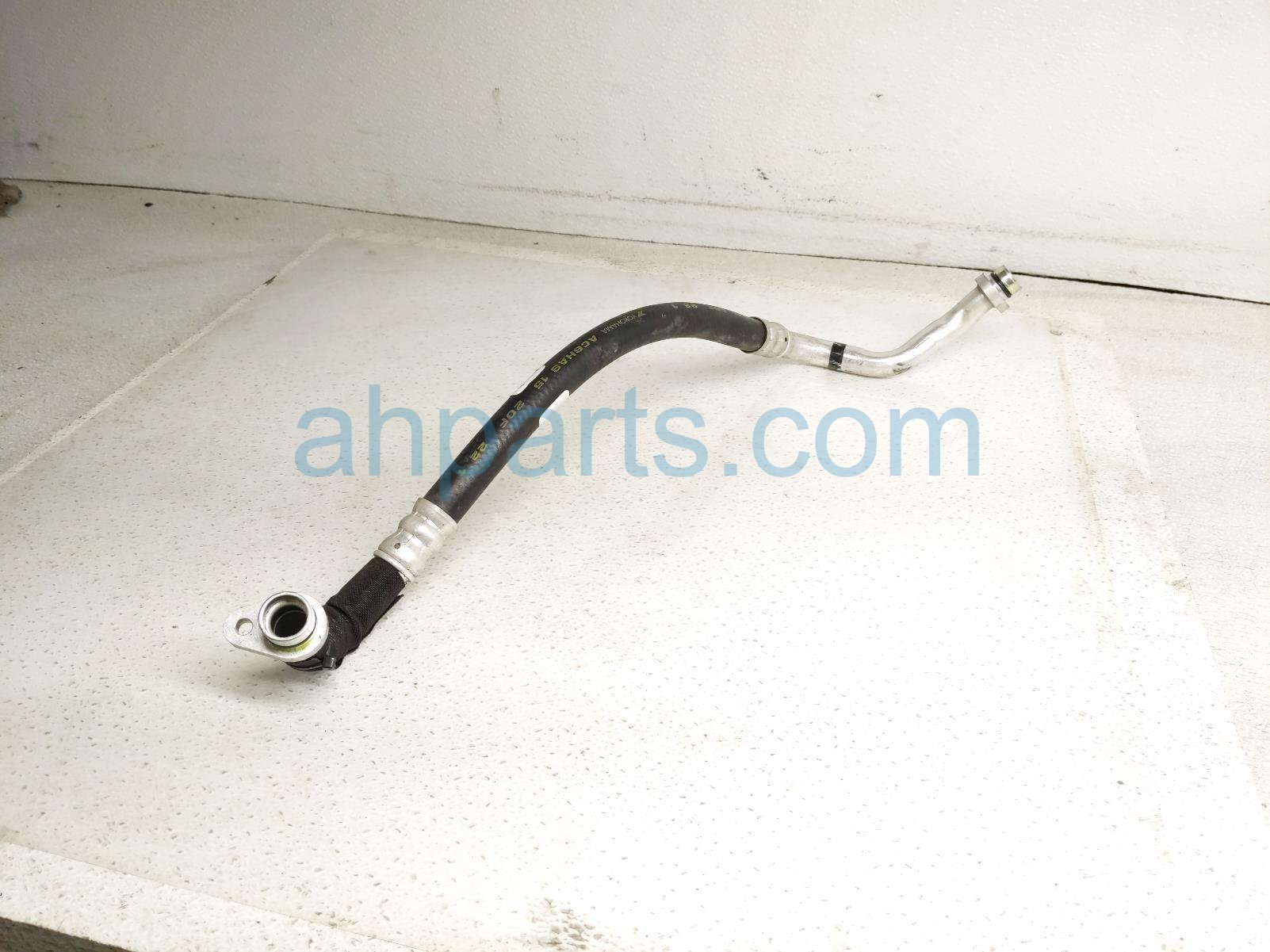 $65 Nissan A/C SUCTION HOSE - 2.5L
