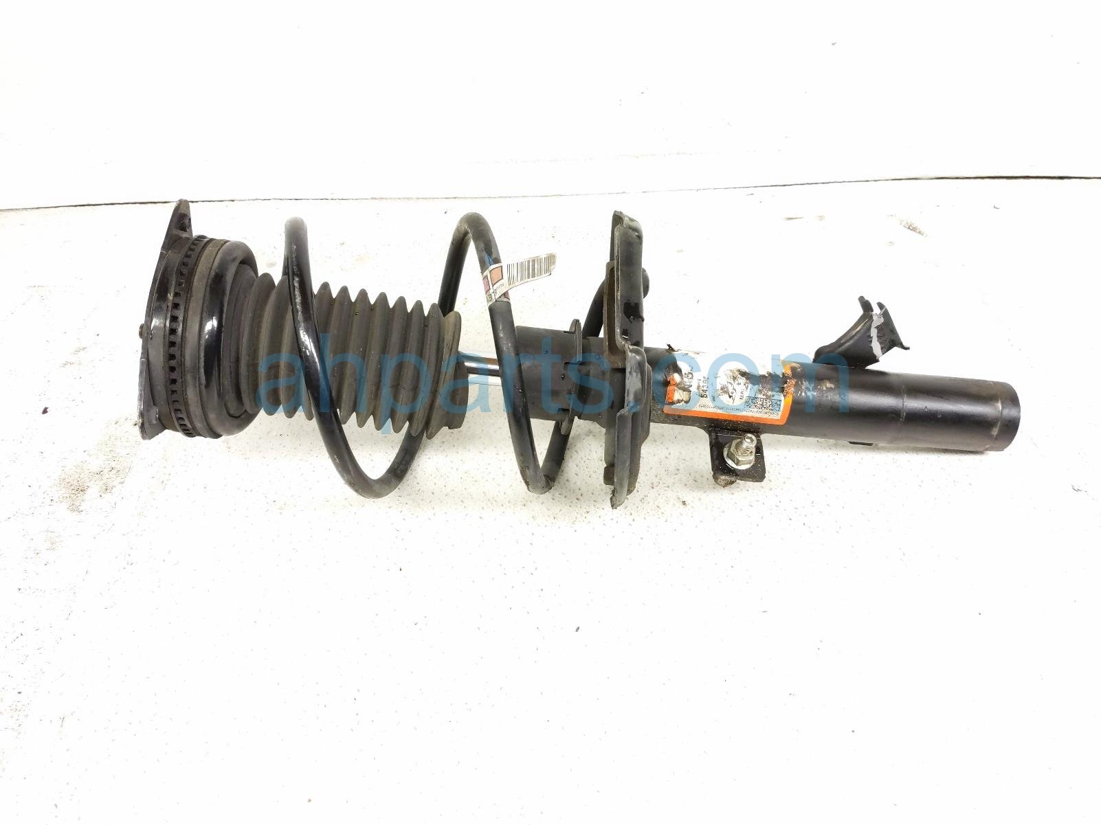 Nissan FR/LH STRUT ABSORBER + SPRING