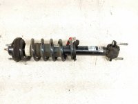 $99 Ford FR/RH STRUT ABSORBER + SPRING $99 Ford FR/RH STRUT ABSORBER + SPRING
