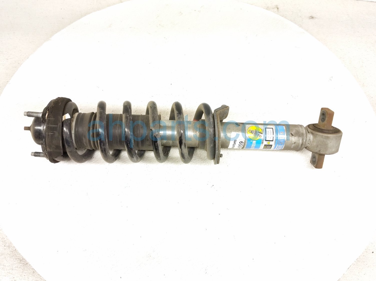 $99 Ford FR/RH STRUT ABSORBER + SPRING