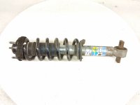 $99 Ford FR/RH STRUT ABSORBER + SPRING $99 Ford FR/RH STRUT ABSORBER + SPRING
