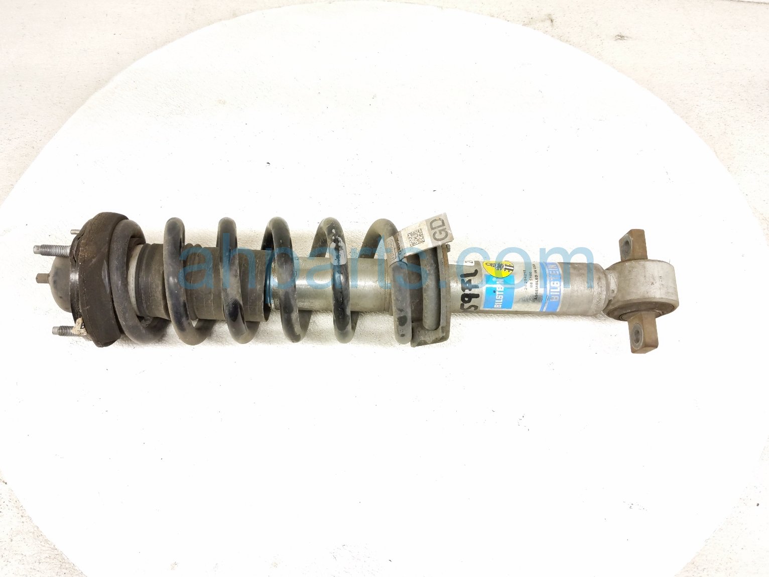 $99 Ford FR/LH STRUT ABSORBER + SPRING