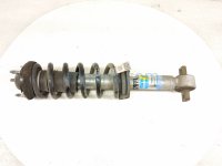 $99 Ford FR/LH STRUT ABSORBER + SPRING $99 Ford FR/LH STRUT ABSORBER + SPRING