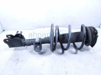 $75 Nissan FR/LH STRUT ABSORBER + SPRING $75 Nissan FR/LH STRUT ABSORBER + SPRING