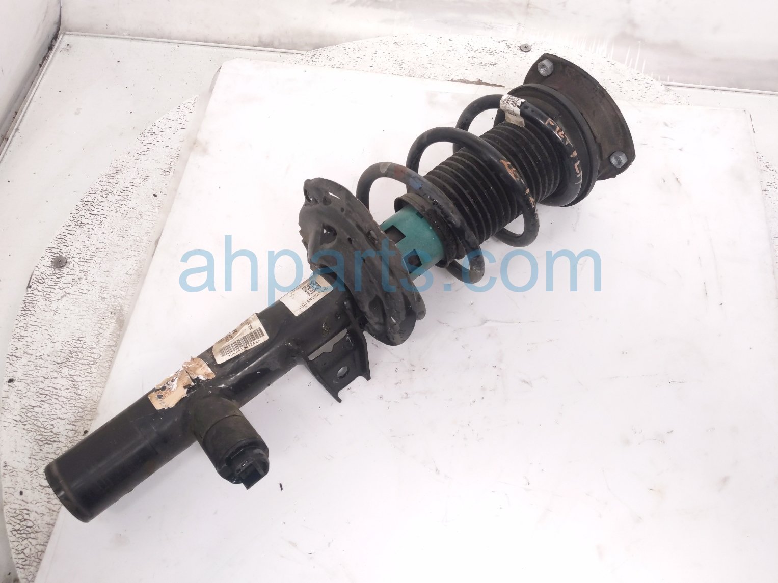 $199 Volkswagen FR/LH STRUT ABSORBER + SPRING