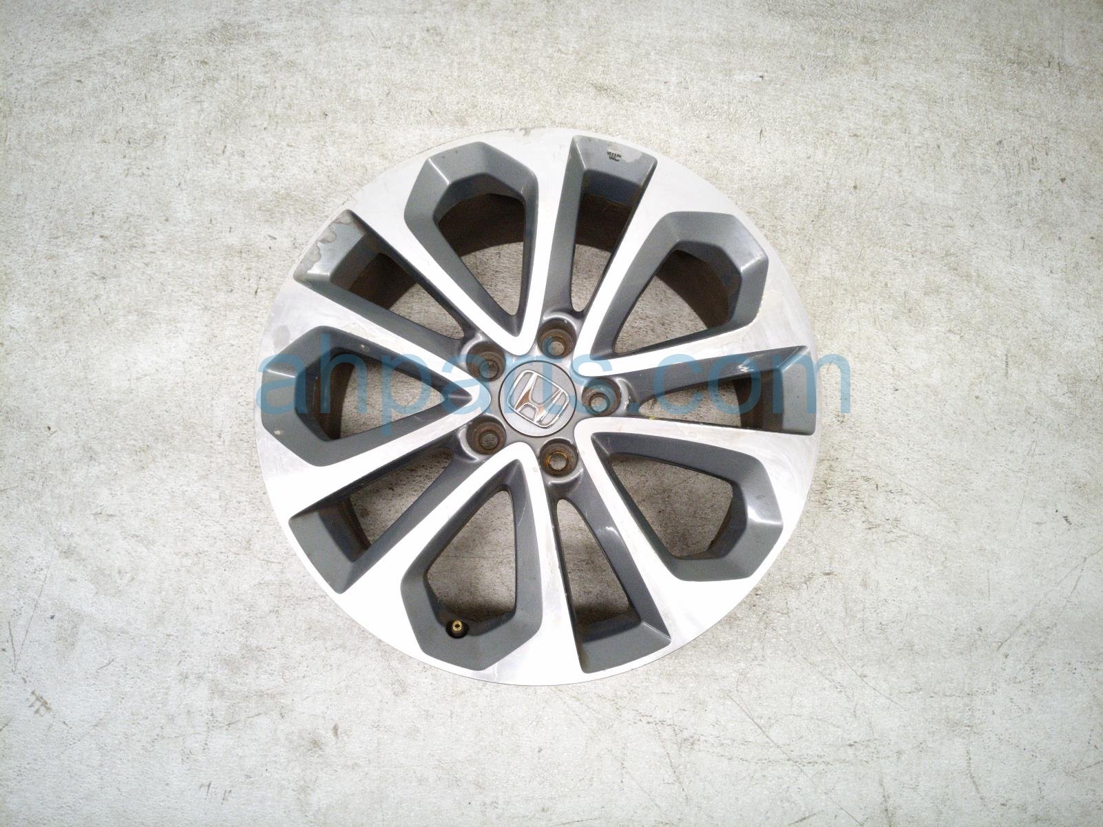 $125 Honda RR/LH WHEEL / RIM